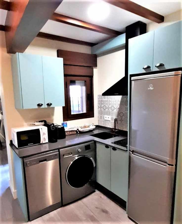 Apartamentos La Rosa Y El Pastor Guijo de Santa Bárbara Rum bild